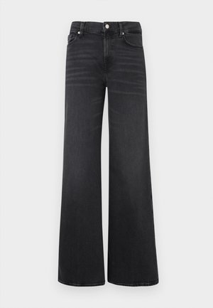 Czarne jeansy z wysokim stanem, szerokimi nogawkami, z przodu zapinane na guziki, z kieszeniami, prezentowane na jednolitym białym tle.