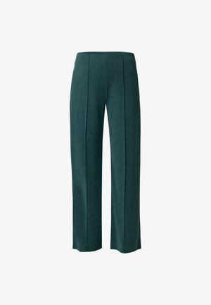 Pantalons larges verts en tissu lisse. Présente des plis avant et une taille ajustée. Pas de fermetures ni de poches visibles.