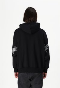 YOURTURN Tröja med dragkedja - black