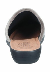 Gray suede slip-on shoe with a low black rubber sole and a natural cork insole. Minimalistic design; open back for easy wear.