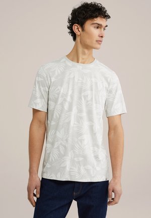 Hvid kortærmet t-shirt med bladmønster, rund halsudskæring og en afslappet pasform. Fremstillet af blødt materiale med en glat tekstur.