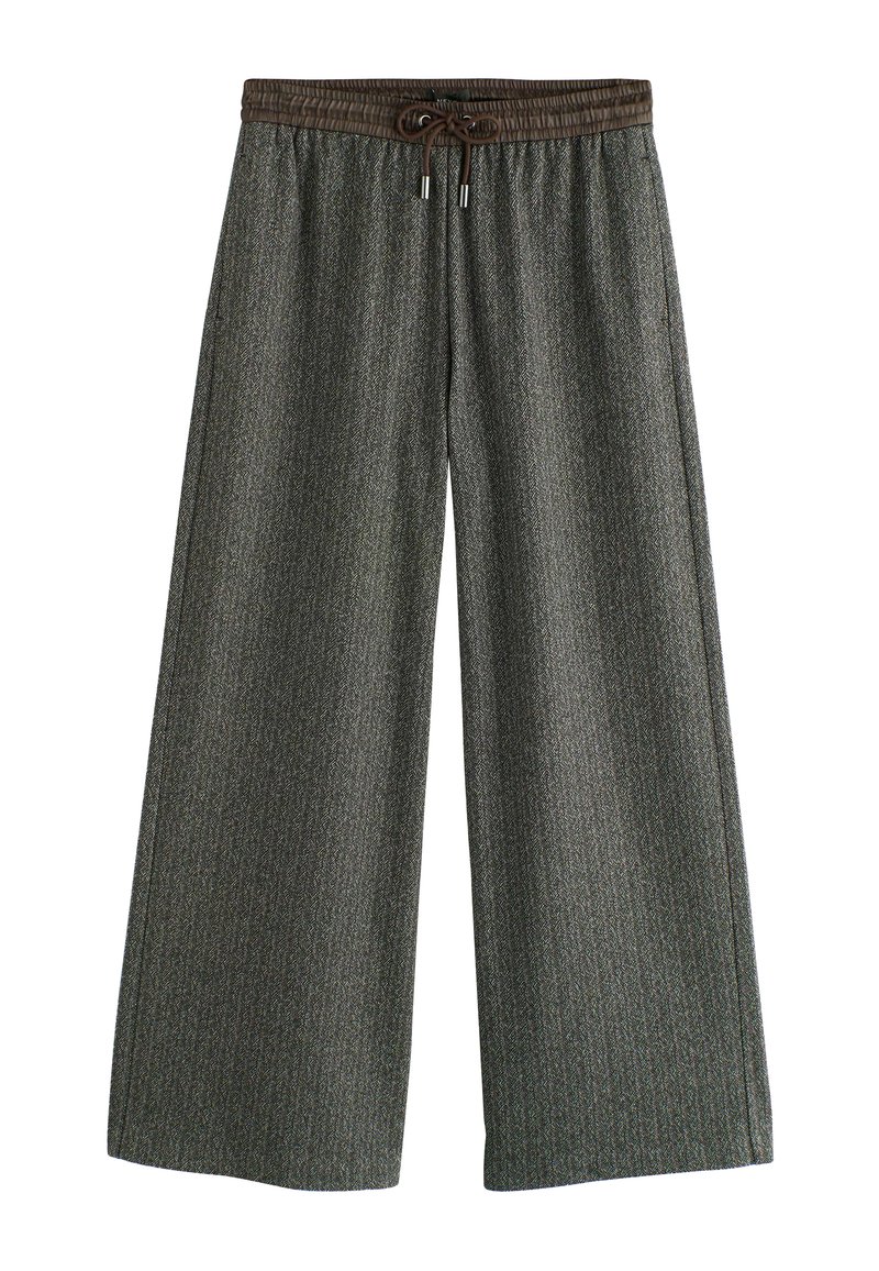Wide-leg trousers in a herringbone pattern, made from a textured fabric. Features a brown elastic waistband with a drawstring.