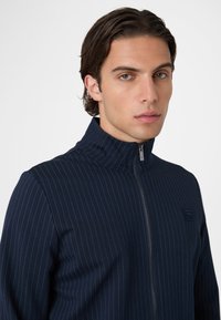 Fila APPAREL BRERA REGULAR PINSTRIPED TRACK  - Chaqueta de entrenamiento - black iris egret striped