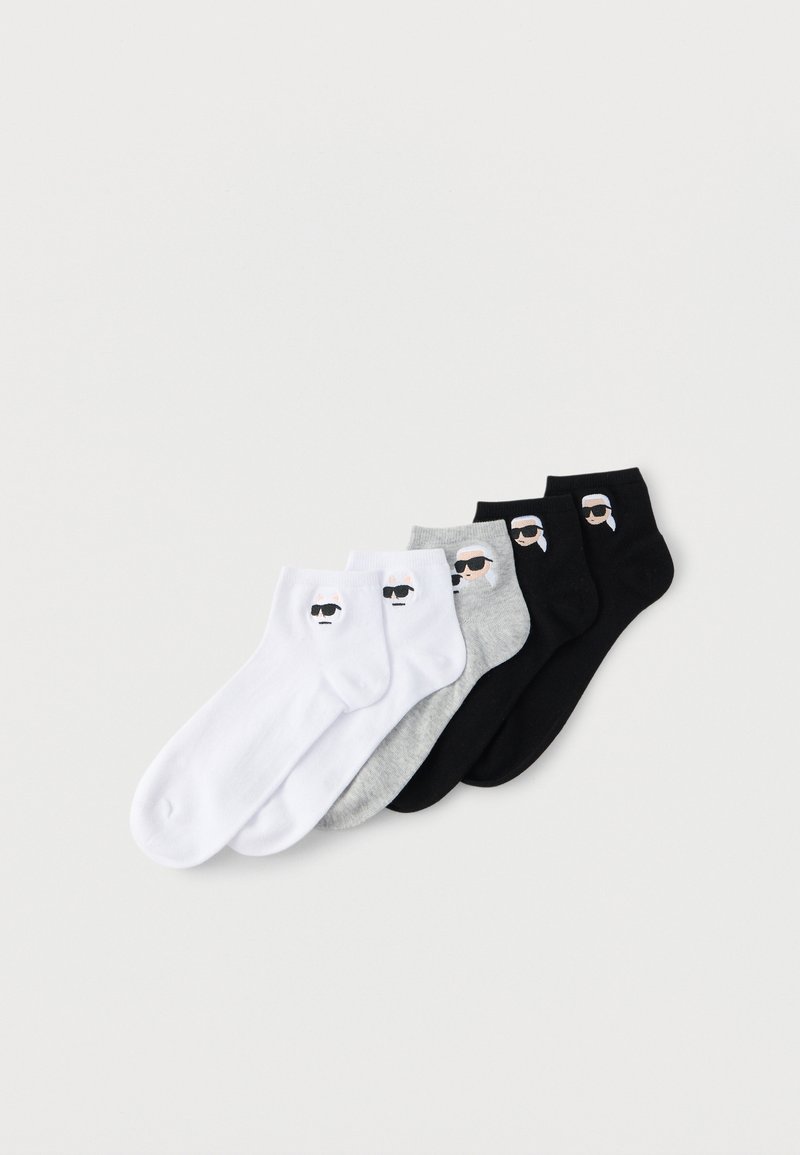 Cotton ankle socks in white, gray, and black, featuring a cartoon face with sunglasses. Each sock has a distinct color and design.