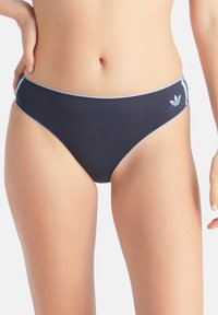 Tmavě modré spodní díly bikin se světle modrým lemováním. Mají klasický střih a vyšívané logo na boku. Vyrobeno z měkké tkaniny.