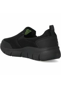 Scarpe slip-on nere con tomaia in rete traspirante, suola ammortizzata, forma arrotondata e logo discreto sul tallone.
