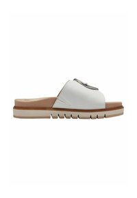 White leather slide sandal with a silver zipper accent, tan footbed, and a thick white sole featuring a zigzag pattern.