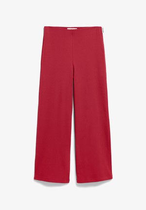 Rote weit geschnittene Hosen aus weichem, elastischem Stoff. Mit einem elastischen Bund und einem schlichten, nahtlosen Design. Keine sichtbaren Verschlüsse oder Taschen.