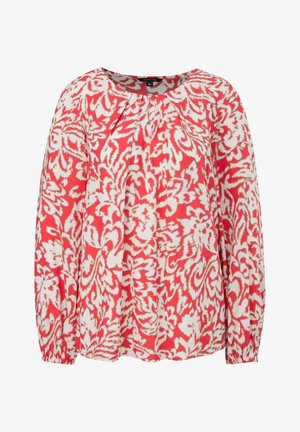 Długa bluzka z długimi rękawami w czerwono-białym kwiatowym wzorze, z okrągłym dekoltem i marszczonym detalem z przodu. Wykonana z lekkiego materiału.