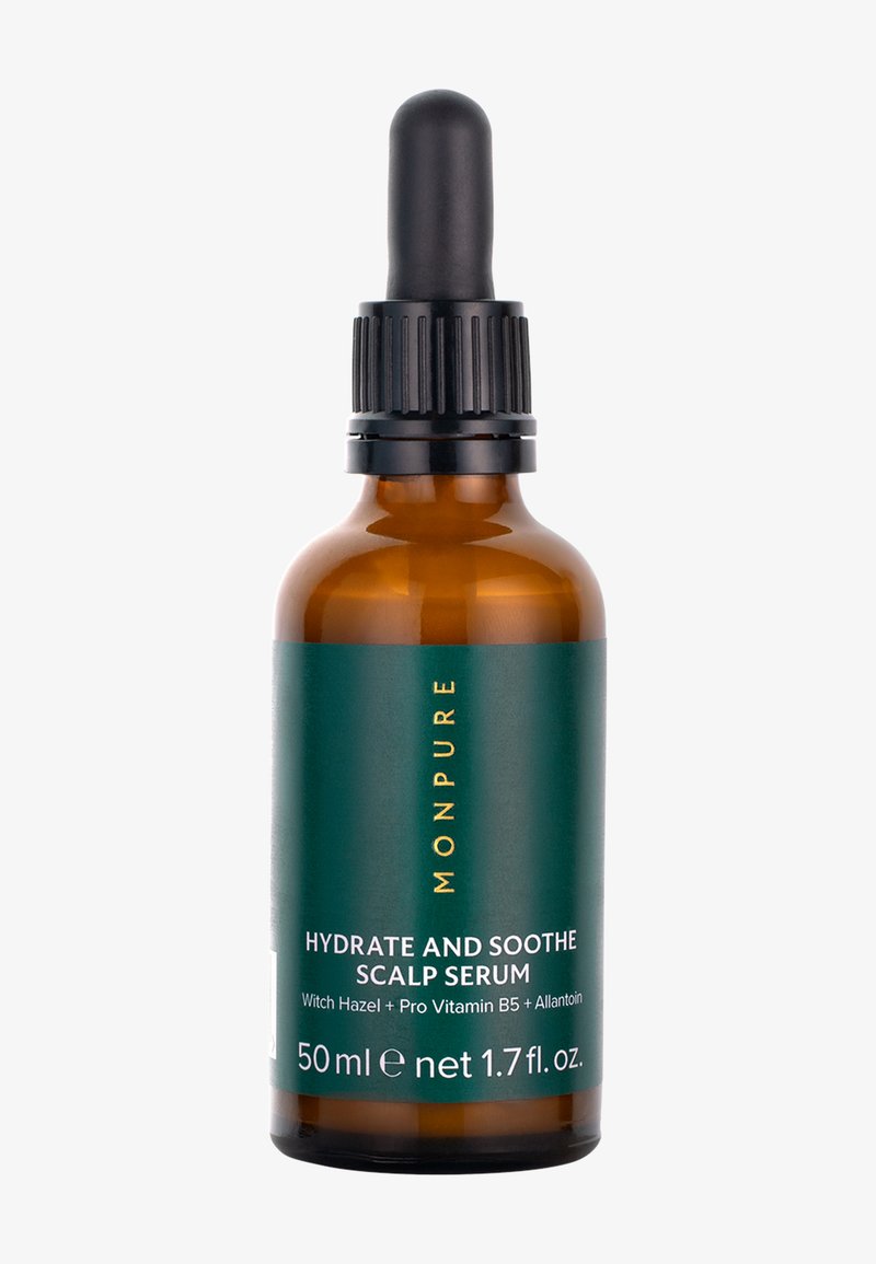 Ruskea lasinen tippaa annosteleva pullo, jossa etiketti Monpure Hydrate and Soothe Scalp Serum, joka sisältää taikapähkinää, B5-vitamiinia ja allantoiinia, 50 ml.