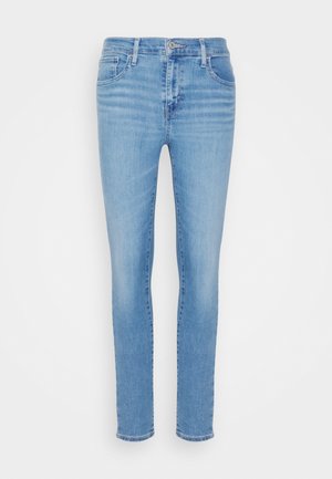 Vaaleansininen farkkutakki slim fit -mallilla, jossa on viisi taskua, nappikiinnitys ja hillitty kuluminen. Valmistettu joustavasta puuvillamateriaalista.