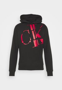 SCATTERED LOGO HOODIE - Sportinis megztinis - black