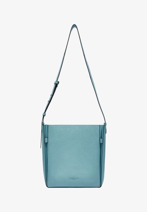 Light blue leather crossbody bag with a structured shape, adjustable strap, and subtle branding at the bottom. Textured finish with clean lines.