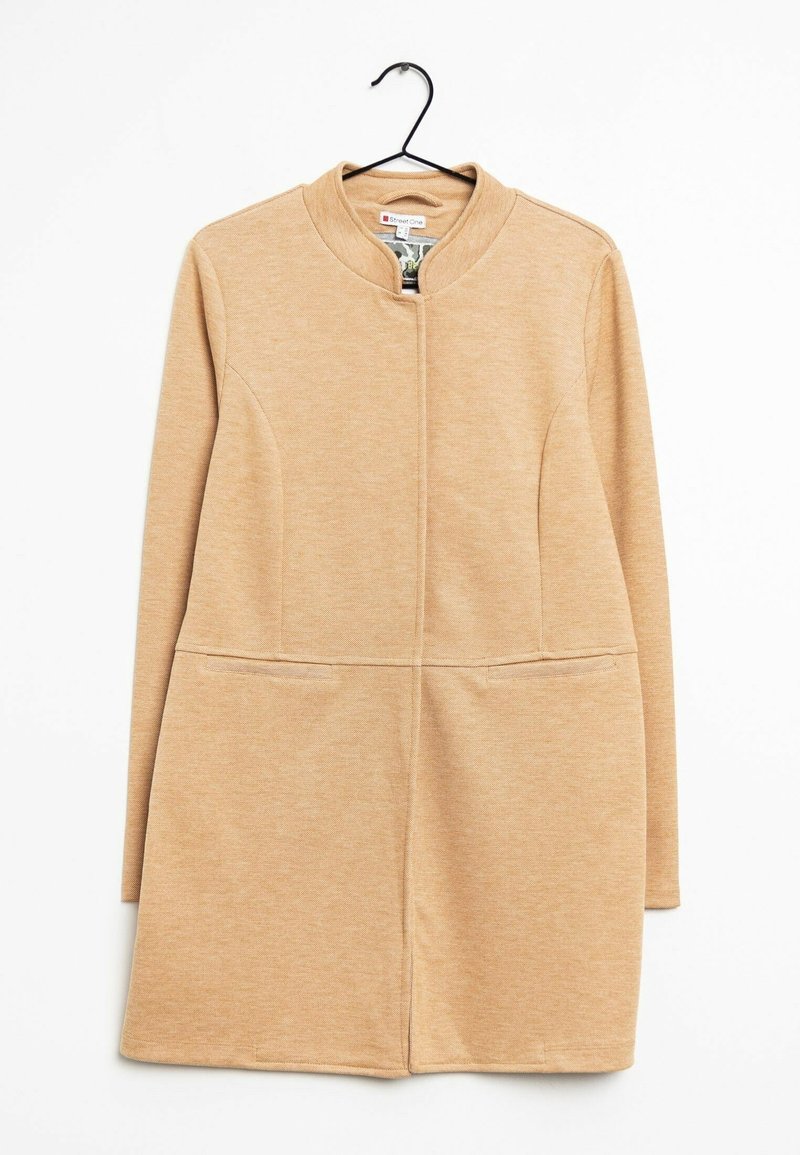 Beige long-sleeve coat with a high collar, two front pockets, and seamless design. Made of soft, textured fabric.