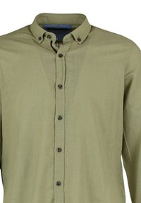 Chemise à manches longues vert olive clair avec col boutonné et boutons foncés sur la patte de boutonnage devant.