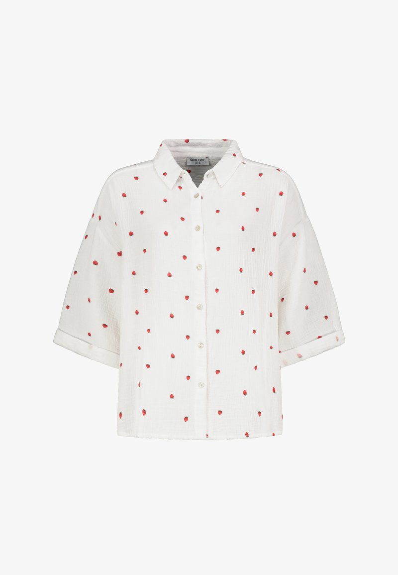 White button-up shirt with short sleeves, featuring a textured fabric and red heart patterns scattered across the surface.