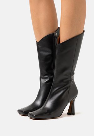 High heeled boots - black