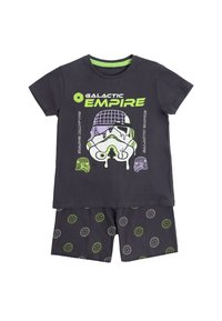 Conjunto de dos piezas para niños en gris oscuro con el texto "Imperio Galáctico" y un casco de stormtrooper estilizado en la camiseta, pantalones cortos estampados con emblemas circulares.