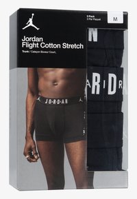 Black cotton trunk underwear pack featuring a stretchable waistband with "JORDAN" logo. Includes three pairs. Size M shown.