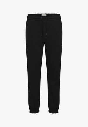 Pantaloni sportivi neri realizzati in tessuto morbido, con vita elasticizzata e cordoncino, tasche laterali e polsini aderenti alla caviglia.