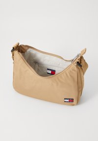 Tommy Jeans DAILY SHOULDER BAG - Handbag - natural khaki