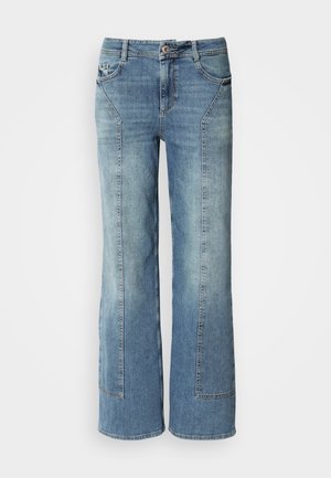 Light blue denim wide-leg jeans with a faded wash, featuring five pockets, contrasting stitching, and a button closure at the waistband.