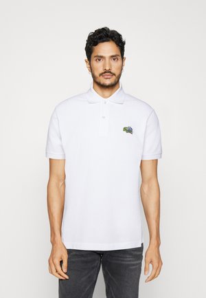 Lacoste LACOSTE X NETFLIX - Poloshirt - white/bridgerton