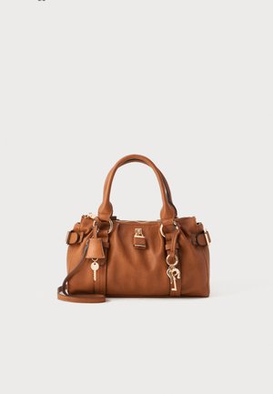 Brown leather handbag with dual handles, adjustable strap, gold-tone hardware, zipper closure, and key charm detail. Smooth texture.