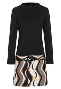 Svart långärmad klänning med en åtsittande överdel och mönstrad kjol. Kjolen har vågiga ränder i orange, svart och vitt med ett runt bälte.