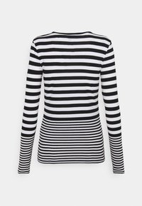 Long-sleeve top featuring black and white horizontal stripes, stretch fabric, rounded neckline, and fitted silhouette. No visible hardware.