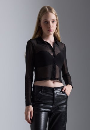 Pikkade varrukatega topp - black