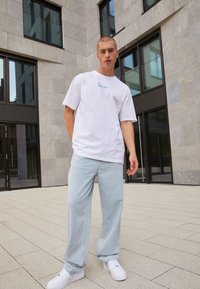 Karl Kani RETRO BAGGY WORKWEAR - Blugi loose fit - bleached blue