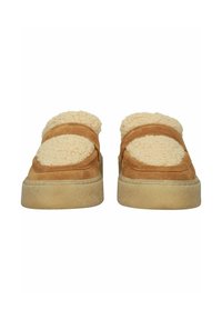 Tan suede slip-on shoes with cream fluffy textile accents on top, featuring a chunky beige sole and two horizontal straps.