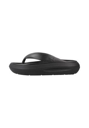 Zwarte flip-flop met een gestructureerde zool, voorzien van een brede band en voetboogsteun. Zacht materiaal en gevormd ontwerp voor extra comfort.