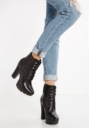 Stivaletti con tacco - black