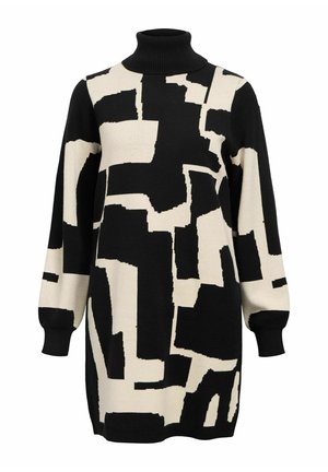 Maglione a collo alto nero e crema con motivi geometrici astratti, con maniche lunghe e vestibilità morbida. Realizzato in morbido tessuto a maglia.