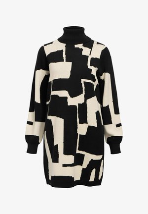 Juodas ir kremas golfo megztinis su abstrakčiais geometriniais raštais, su ilgomis rankovėmis ir laisvu kirpimu. Pagamintas iš švelnios megztos medžiagos.