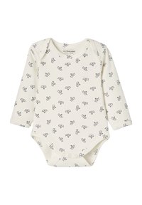 Langärmliger Einteiler aus cremefarbener Baumwolle mit schwarzem Origami-Vogel-Muster. Verfügt über Druckknöpfe im unteren Bereich und einen runden Halsausschnitt.