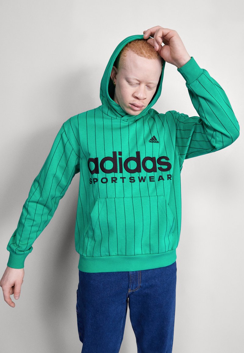 adidas Sportswear XPRESS Kapuzenpullover court green/grün Zalando.de