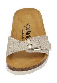 Silver slide sandal featuring a sparkling upper, adjustable buckle closure, soft suede footbed, and a light, textured white sole.