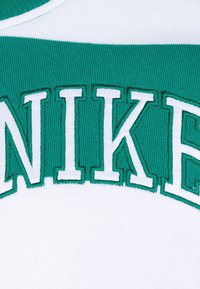 Nike Sportswear CLUB STRIPE CREW UNISEX SET - Spodnji deli trenirk - malachite