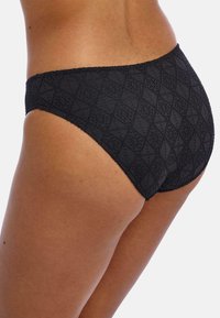 Black lace bikini briefs with a textured diamond pattern, featuring a high-waisted design and soft elastic waistband.