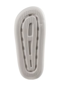Sole of a shoe in white rubber, featuring textured grip patterns, grooves, and size markings. Smooth edges with a clean design.