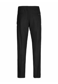 Pantalon noir ajusté avec taille élastique et deux poches passepoilées à l'arrière, présenté de dos sur un fond blanc.