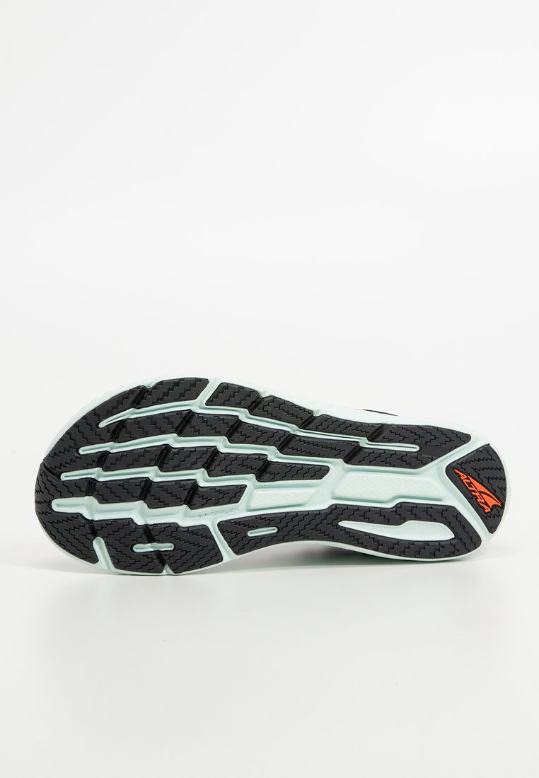 Semelle de chaussure de sport dotée d'une surface en caoutchouc noir texturé avec des accents vert menthe et des motifs de traction moulés. Logo de la marque mis en évidence.