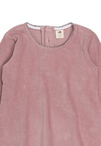 Hellrosa Corduroy-Oberteil mit Rundhalsausschnitt, das eine Knopfverschluss auf der Rückseite und einen gestreiften Innenkragen aufweist. Weicher, strukturierter Stoff.