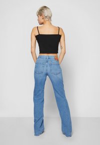 Diesel 1969 D-EBBEY DIESEL LIBRARY - Calças de ganga à boca de sino - denim