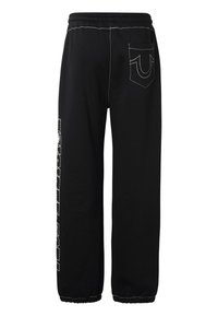 Melnas sporta bikses ar elastīgu jostu un aprocēm, baltām šuvēm, aizmugurējo kabatu ar izliektu detaļu un vertikālu baltu grafiku kreisajā kājā.