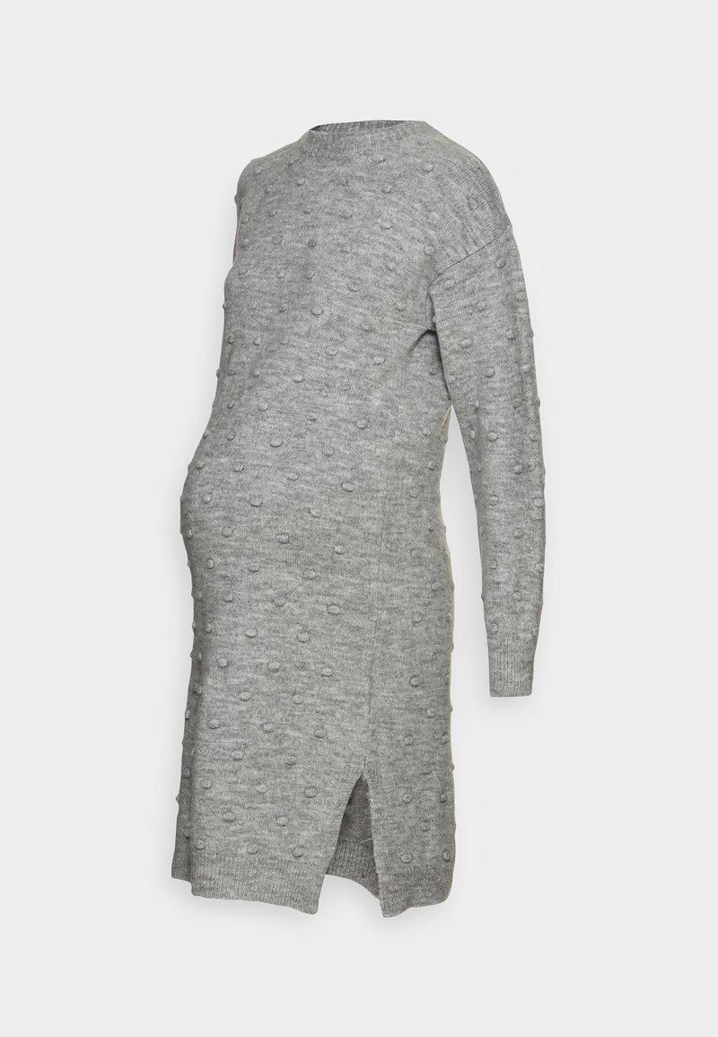 Grijze gebreide zwangerschapsjurk met een ronde halslijn, een gevarieerde bobbelpatroon, lange mouwen en zijsplitten voor extra bewegingsvrijheid.