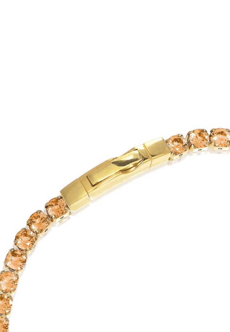 Bracelet en ton doré avec des cristaux ronds de couleur orange clair reliés par des maillons en métal ; comprend un fermoir sécurisé pour la fermeture.